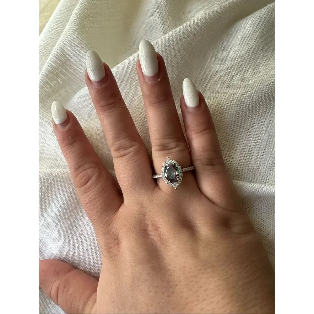 Iridescent cubic zirconia oval cut ring